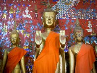 Buddha sculpture  Buddha stops the waters. Sculptures in a chamber of a Buddhist temple, Luang Prabang, Laos